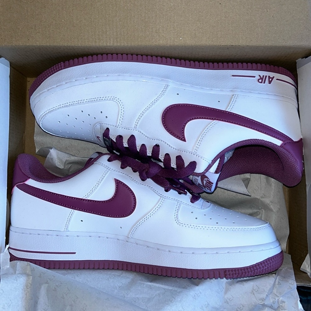 Brand new Nike Air Force Ones with purple accents, never warn!